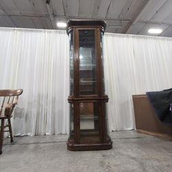 Pulaski Lighted Wood Curio Cabinet with Curved Glass