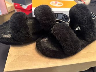Black ugg slippers wi to white logo