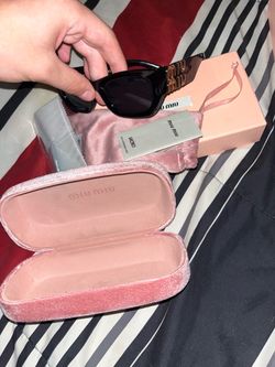 Miu Miu Black Sunglasses with Gold Logo