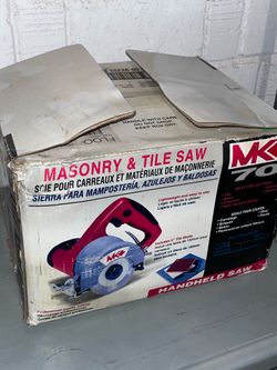 Masonry & Tile Saw tool handheld red silver and black
