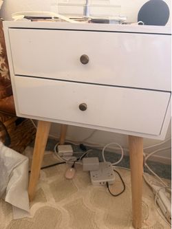 White bedside table with two drawers