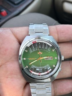 Rare Watch Orient College Perpetual Multi Year Calendar vintage in new condition from 80s Automatic Japan - green color works perfectly keep exactly t
