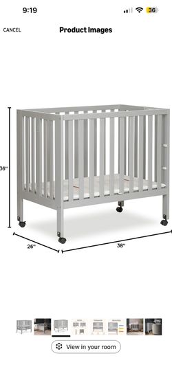 Mini crib with mattress