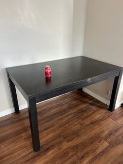 IKEA Bjursta with two chairs