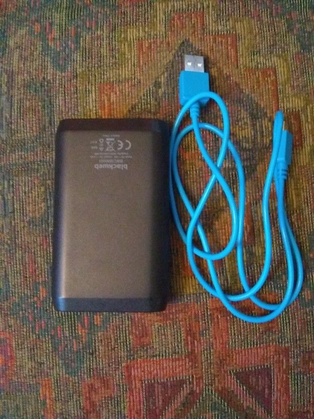 Blackweb portable charger and Seagate backupplusslim 1TB external hard drive