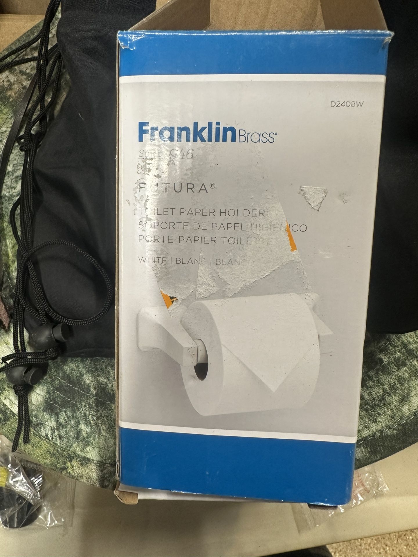 Franklin Brass Futura wall-mounted toilet paper holder.