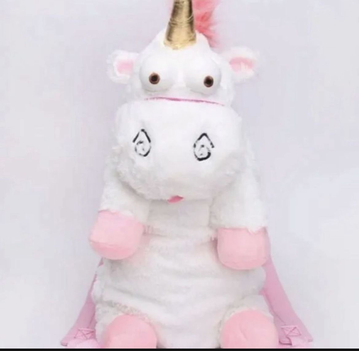 Bought at universal studios Universal Studios Despicable Me Unicorn Plush Large Fluffy Backpack