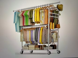 Brand new large clothes rack with shelf loads 1100lbs 4 rods