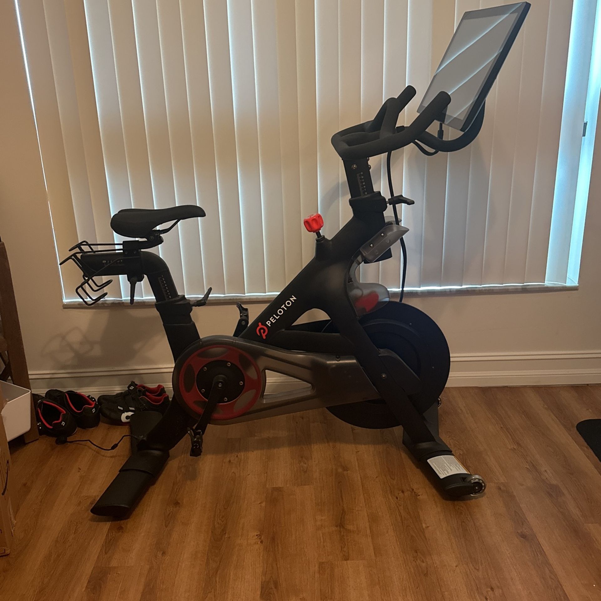 Peloton Bike + 2 Pairs Of Shoes