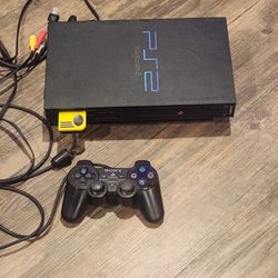 Playstation 2 with 7 Games