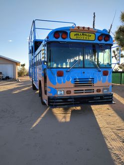 1989 blue bird bus with 8 bunk beds elec stove mini fri 20 ft observation deck on top