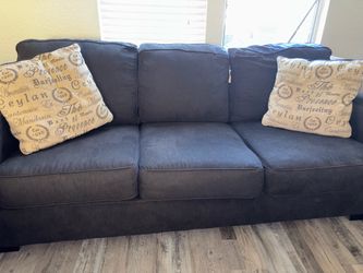 Dark gray couch set with decor pillows
