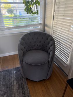 Gray swivel accent chair