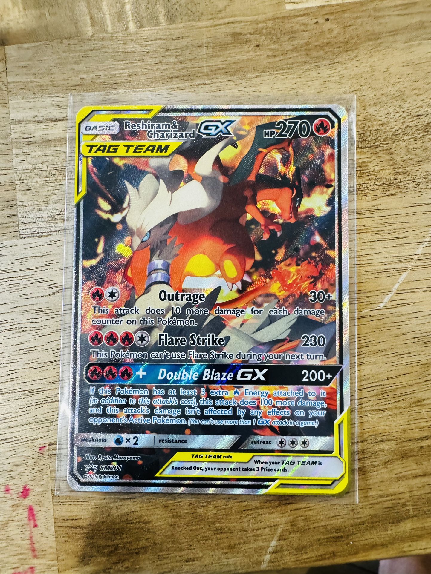 Reshiram & Charizard GX Tag Team