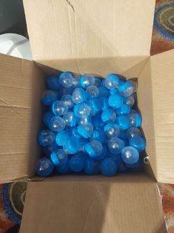 Box Lot of Toy Capsules (Power Rings)
