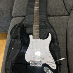 Squier Sonic Stratocaster Electric Guitar(Black) with Fender Frontman 10G Amp