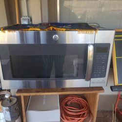 GE Microwave Oven Over The Stove
