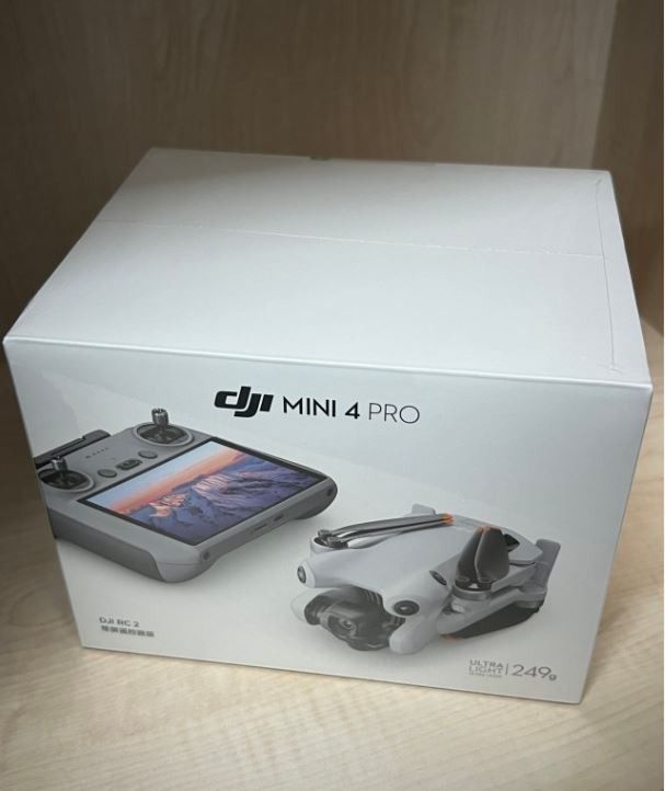 DJI Mini 4 Pro Drone + DJI RC 2 Controller.