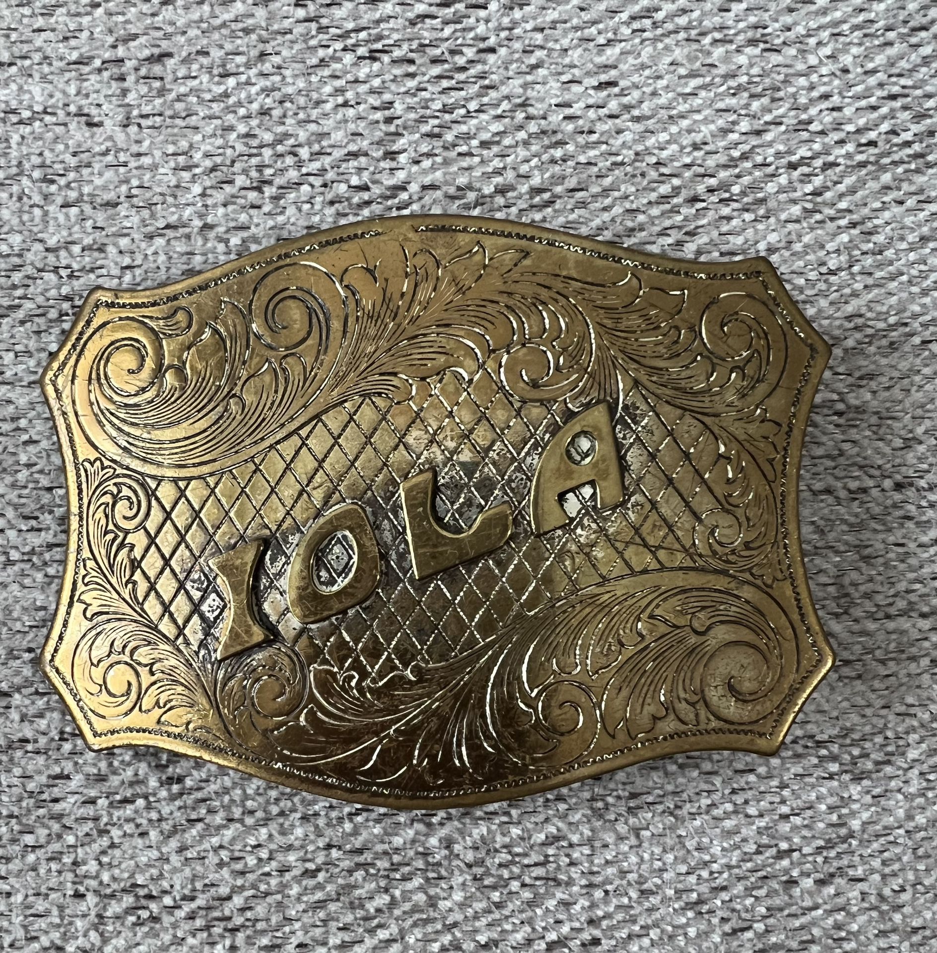 IOLA - custom name 70's ornate engraving swirl pattern brass Belt Buckle  Please refer to the pictures as to what you will be getting with this lot. I