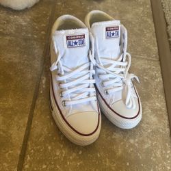 BRAND NEW*** Size 6 in woman’s White High Top Converse. Never Worn. 
