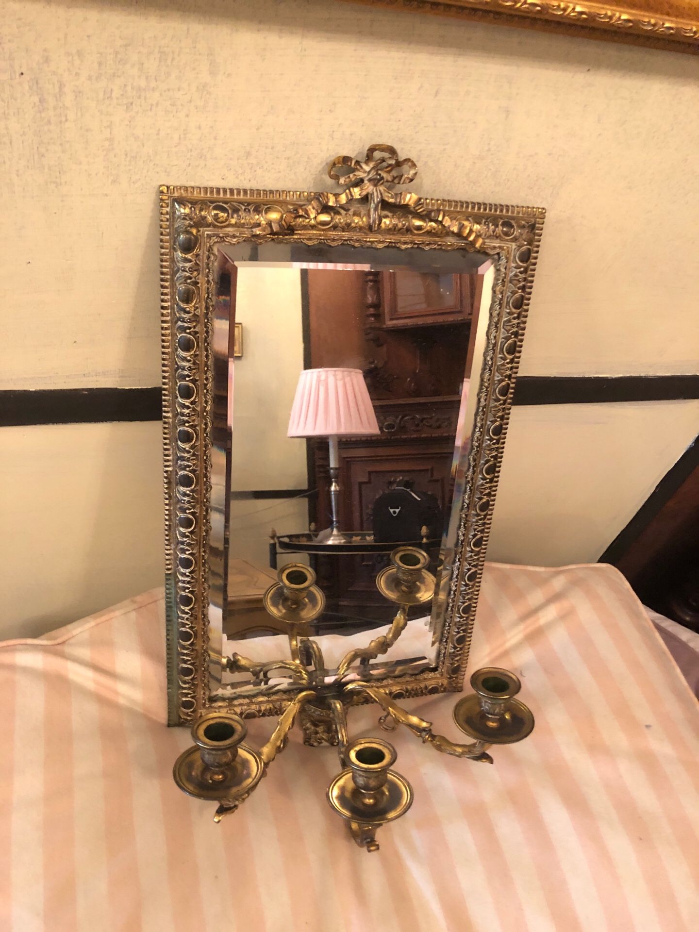 Antique gold gilded mirror with candleholder