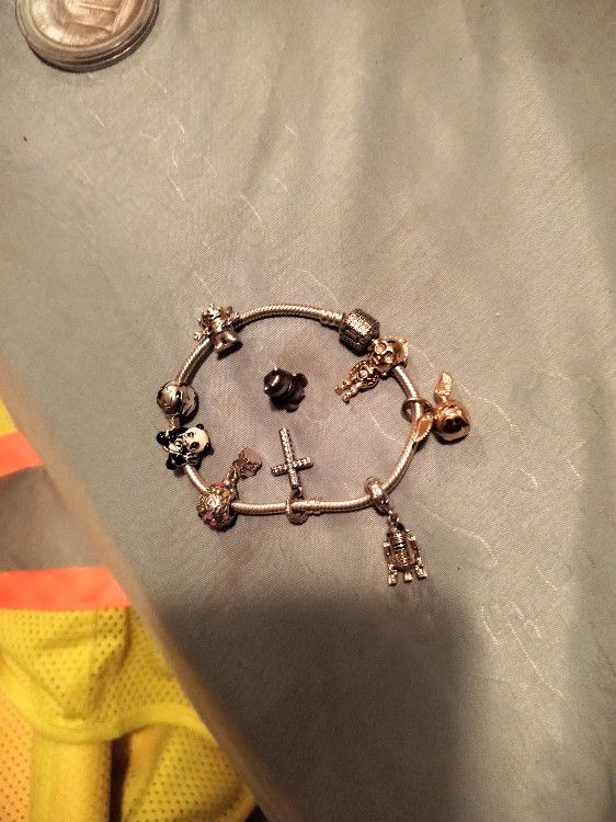  authentic Pandora charm bracelet and charms will sell separately