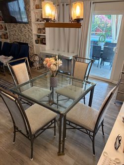 Glass Top Dining Table + 4 Upholstered Chairs – Excellent Condition $175