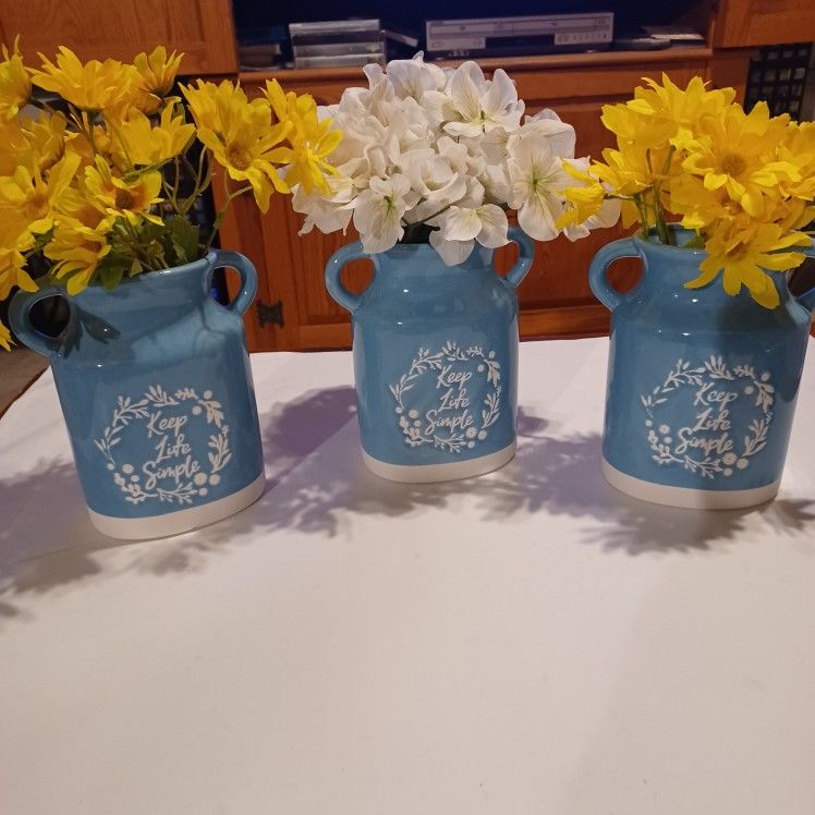 New "Keep Life Simple" Vase with flowers.  Home decor New with tags. Have 3 available. $5 each