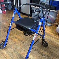 Walker with wheels and a seat