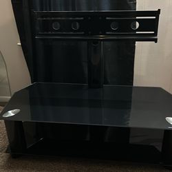 Black Glass Tv Stand(47 Inches Long X 20 Inches Wide) In Excellent Condition