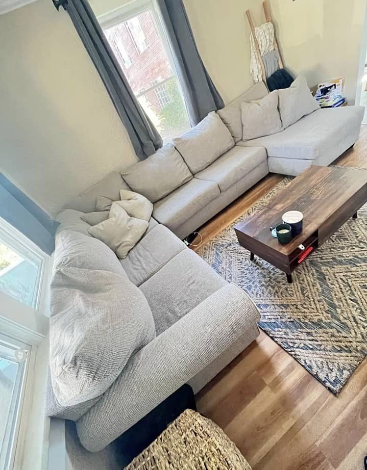 Light Gray Sectional With Rug And Coffee Table. Free Delivery 