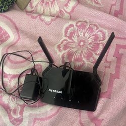 NETGEAR WiFi Router (R6120) - AC1200 Dual Band Wireless Speed (up to 1200 Mbps) | Up to 1200 sq ft Coverage & 20 Devices | 4 x 10/100 Fast Ethernet an