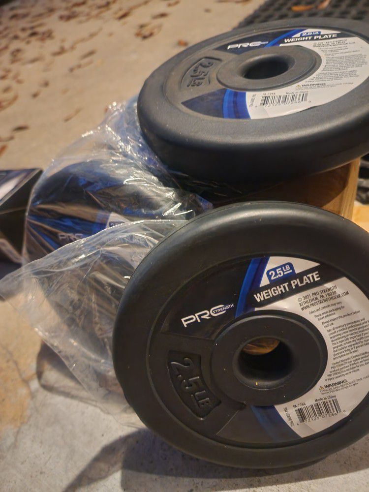 SET OF 4 - 2.5 LB WEIGHT PLATES