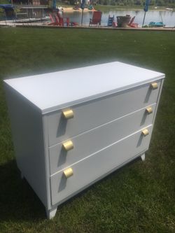 Sooo pretty white small dresser with brass hardware
