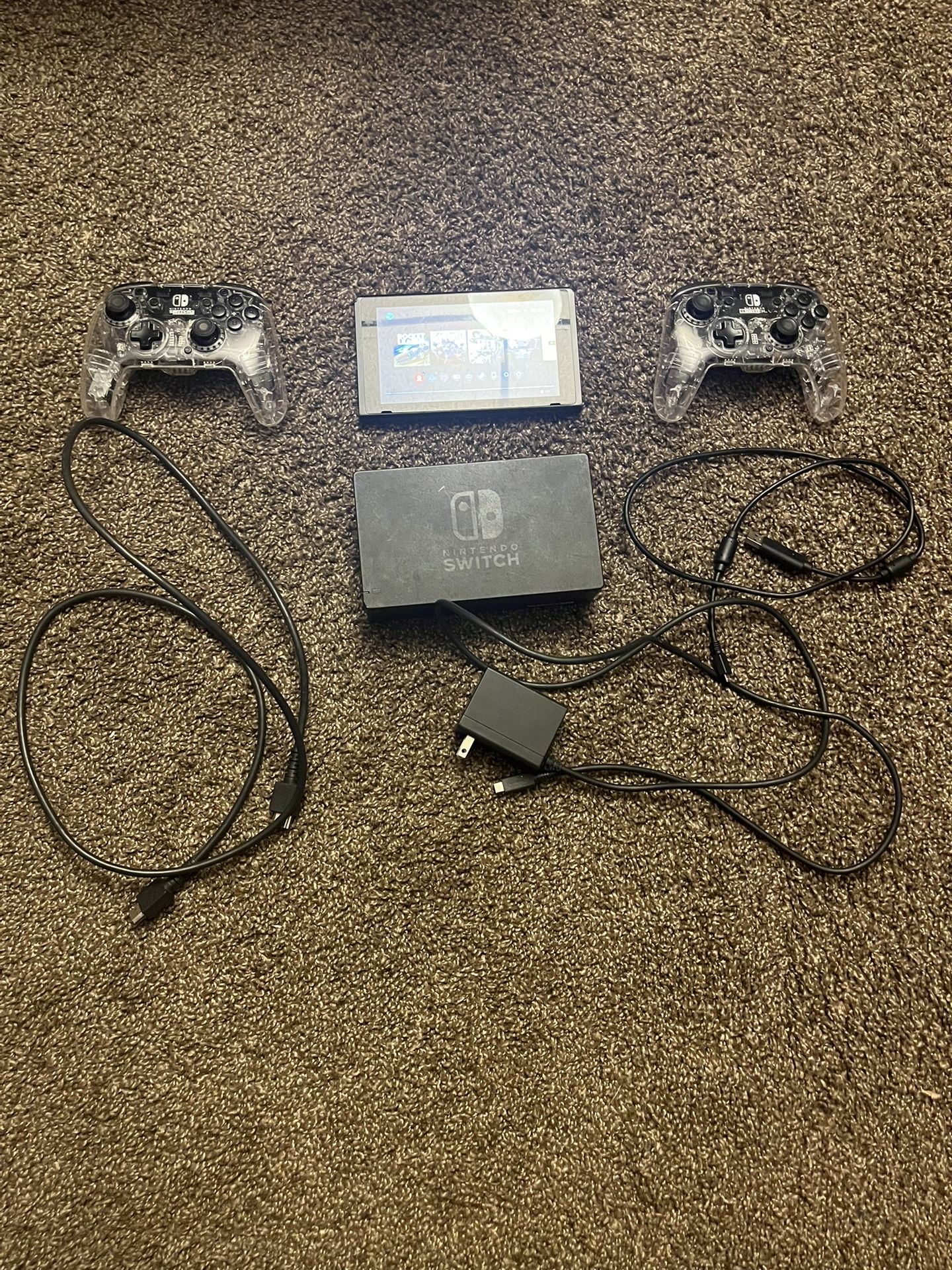 Nintendo Switch And Doc With 2 Pro Controllers, HDMI Cord And Power Cord