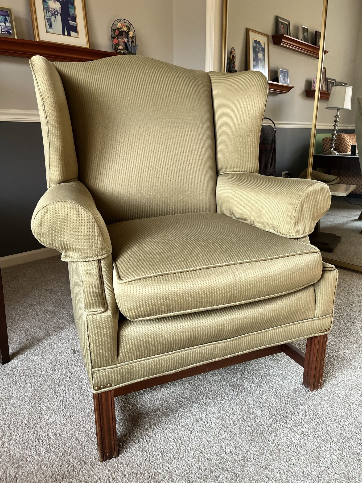 Chippendale style wingback chair with ottoman