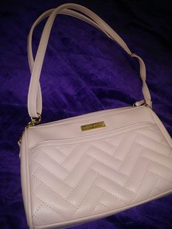 Jaclyn Smith pinkish bag