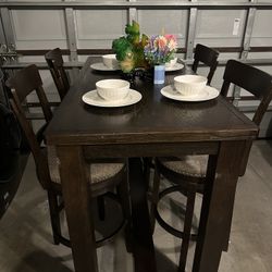 Bar height dining table