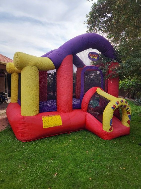 Medium Sized Bounce House And 2 Blowers