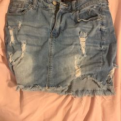 Light denim wax jeans, Y2K skirt