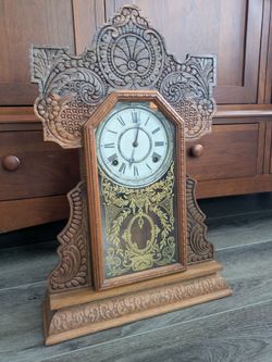 Late 1800s early 1900s antique wood mantle kitchen clock. 100+ years old. Not running. Lovely looking and sounding gong chime but not working. Missing
