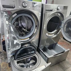 LG SET STEAM WASHER AND STEAM  DRYER WITH SIDEKICK PEDESTAL 