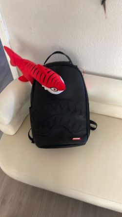 Sprayground Plush Shark Big Bite Backpack.