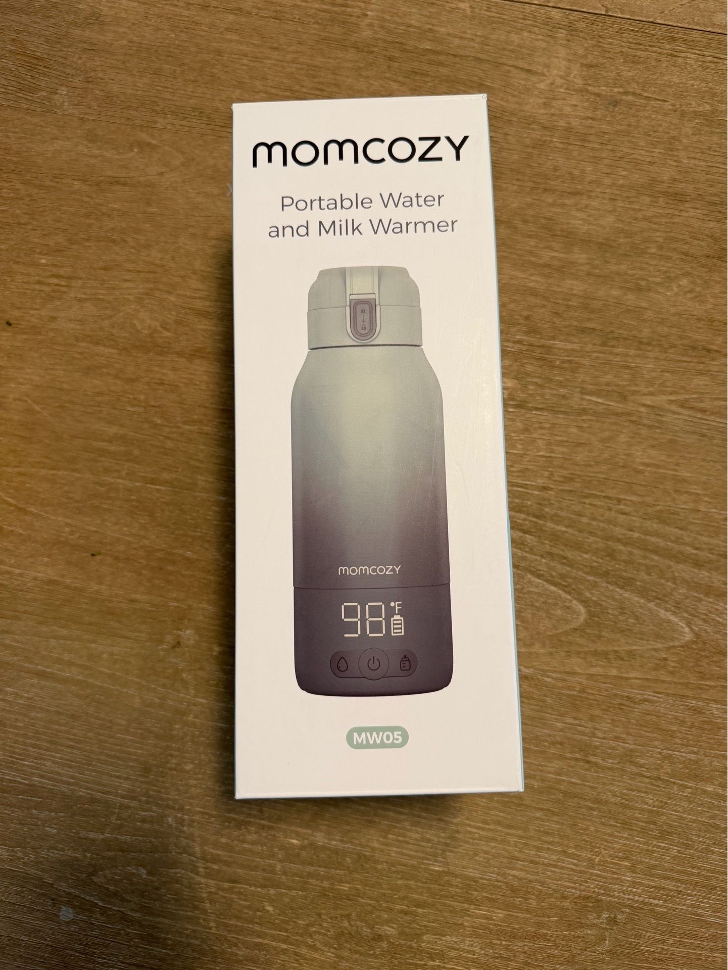 MomCozy portable bottle warmer (never opened!)