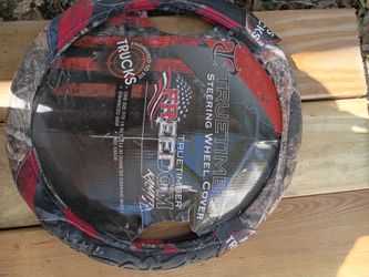 A brand new camouflage truck steering wheel cover