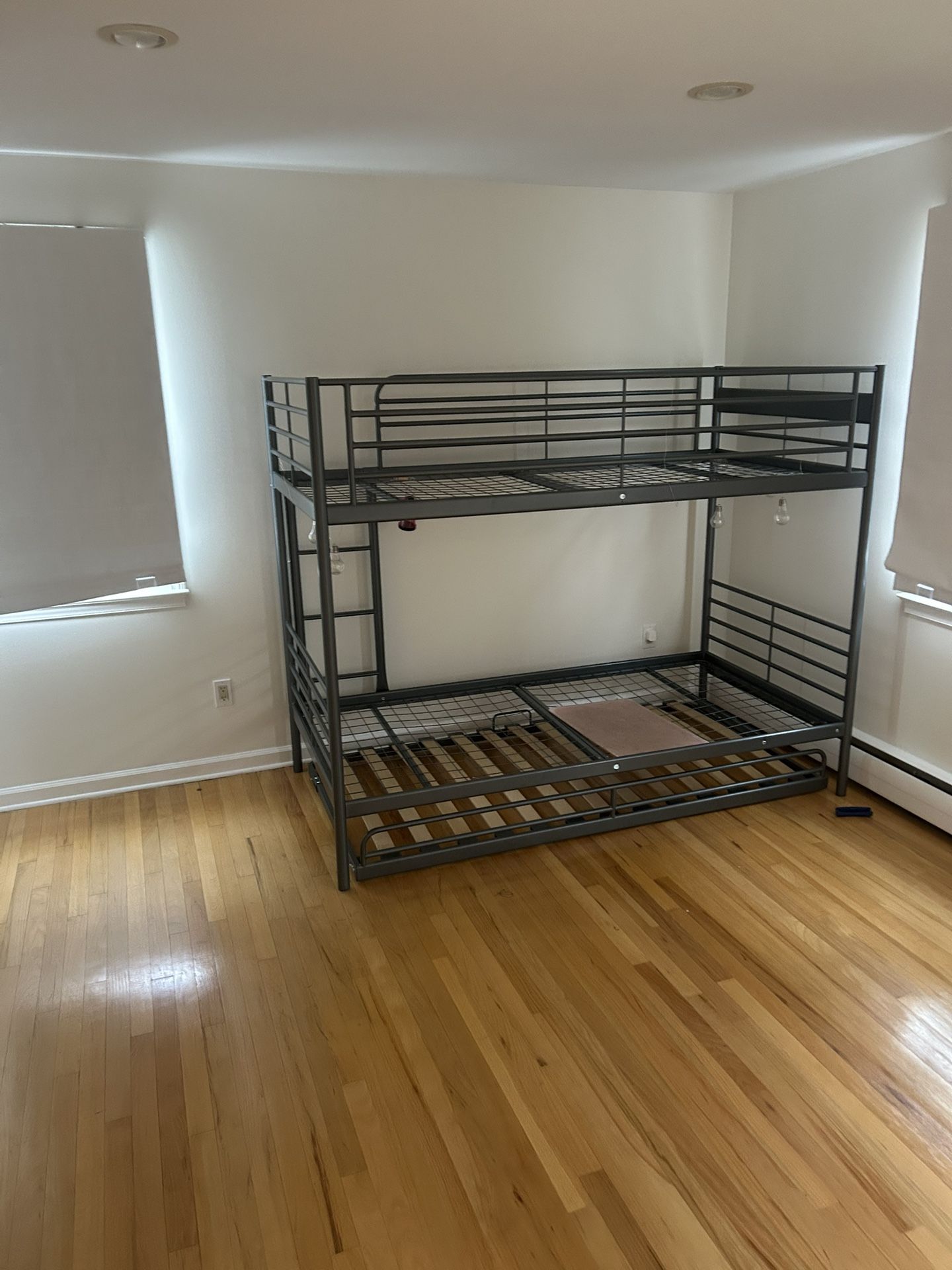 The bunkbed of all bunkbeds with roll out trundle very sturdy and durable with ladder great condition will deliver straight to door 150 bucks