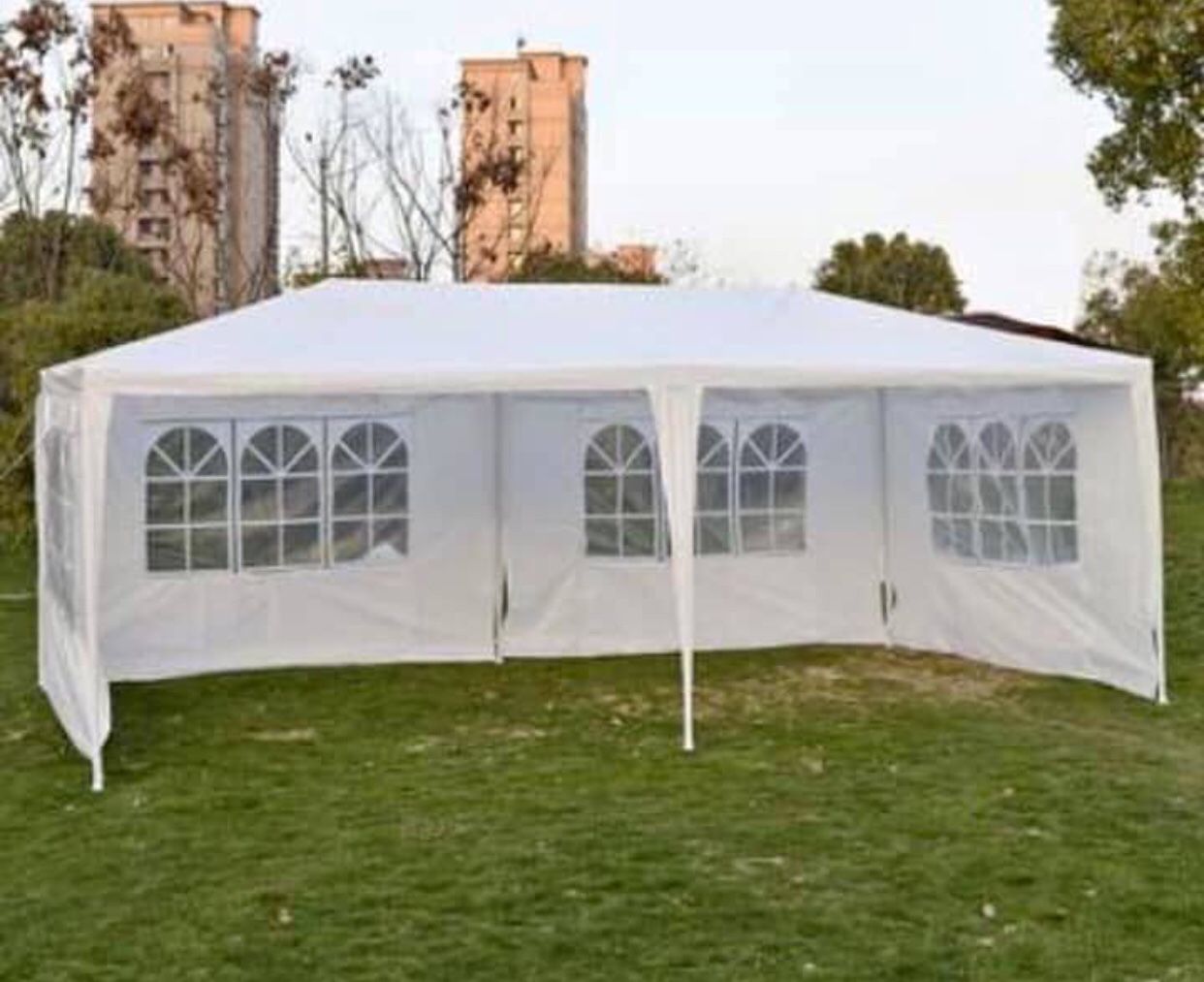 Canopy tent 10x20 ‘ New w/ 4 walls