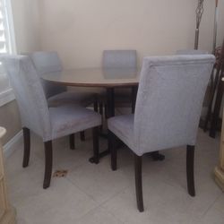 Round Dining Table Set With Glass Top And 4 Sturdy  Chairs But It Can Sit  Up To. 6 People 