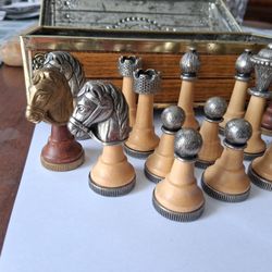 Classic chess pieces  metal and maple wood, hand finished.
