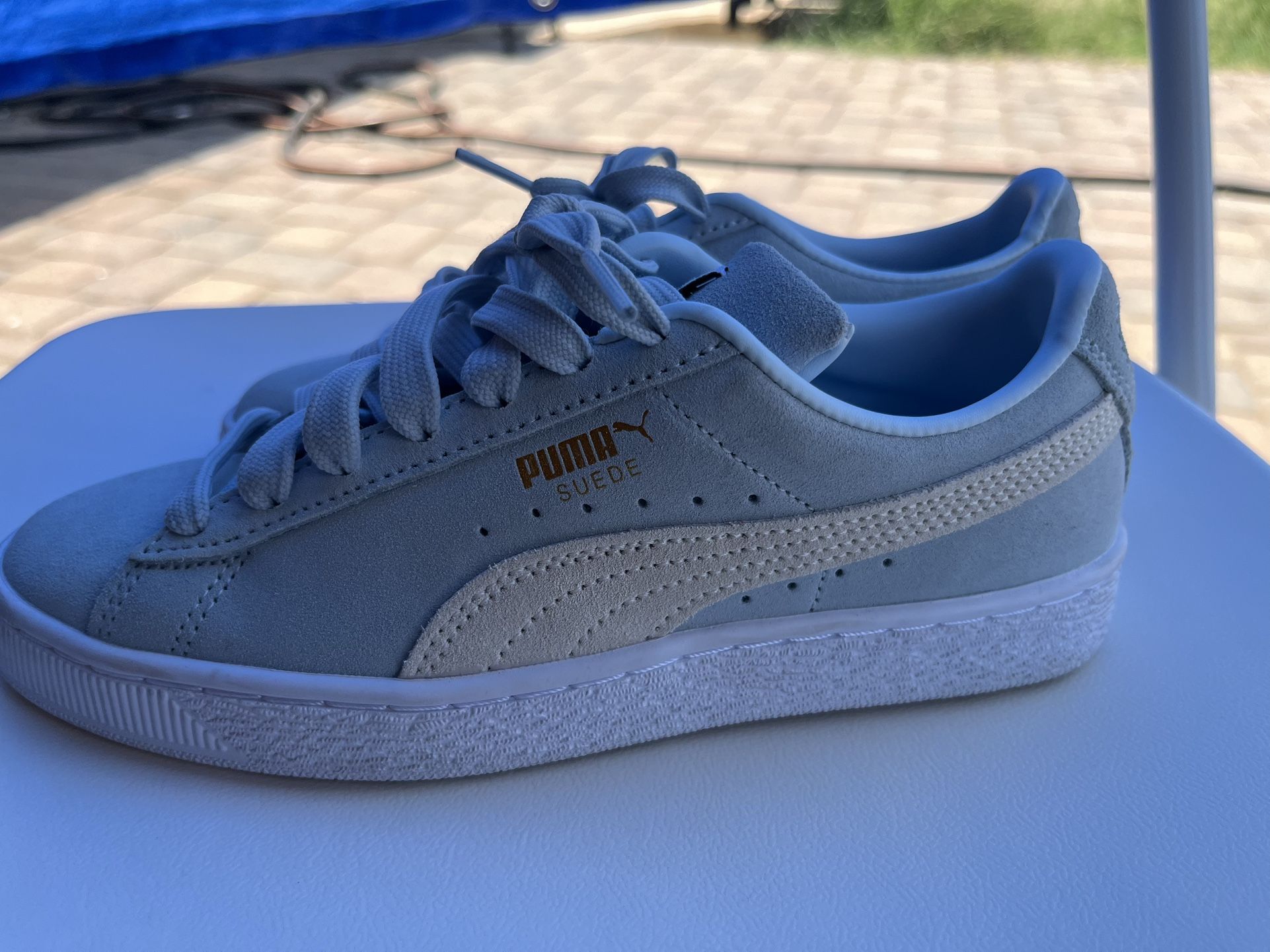 Size 6 Women’s light blue Puma Suede Classic